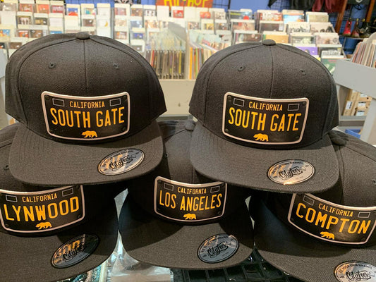 City Hats - snap backs with leather patch